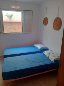 Postel nebo postele na pokoji v ubytování Sea Home + 11 fotografií