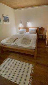 Postel nebo postele na pokoji v ubytování Chalet Im Wieselti