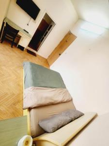 TV a/nebo společenská místnost v ubytování Đà Lạt Chay Guest House + 8 fotografií