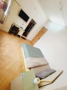 TV a/nebo společenská místnost v ubytování Đà Lạt Chay Guest House