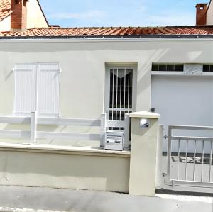 En balkon eller terrasse på Maison charmante près de la plage - Les Sables-d'Olonne