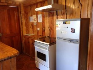 Una cocina o kitchenette en Cabañas el arrayan neltume