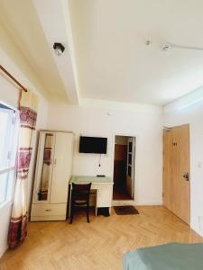 TV a/nebo společenská místnost v ubytování Đà Lạt Chay Guest House