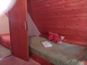 Postel nebo postele na pokoji v ubytování Vila Lara