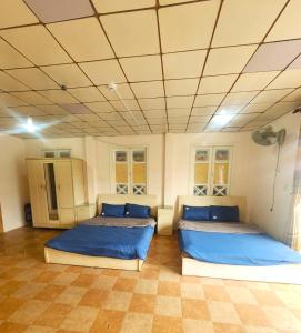 Postel nebo postele na pokoji v ubytování Đà Lạt Chay Guest House