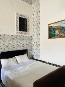 Postel nebo postele na pokoji v ubytování Fes Iconic yedouna hostel