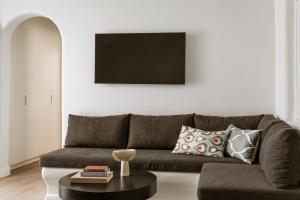 Posezení v ubytování NĒRO Suites by NOMÉE Hospitality Group