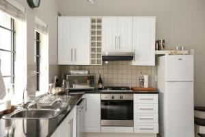 Η κουζίνα ή μικρή κουζίνα στο Lagoon Terrace 1