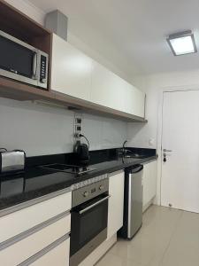 Kuchyň nebo kuchyňský kout v ubytování Green Park Apartamento de 1amb en 2do piso Vista Laguna