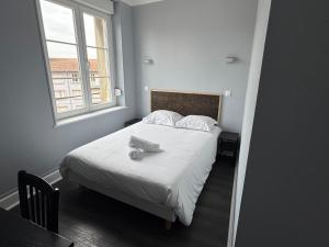 Postel nebo postele na pokoji v ubytování Abc Hotel