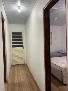 Postel nebo postele na pokoji v ubytování Casa da Mariângela + 3 fotografie