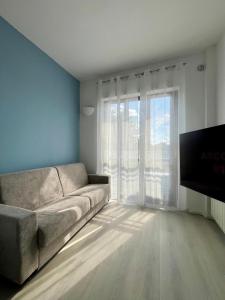 Televisyen dan/atau pusat hiburan di Appartamento Blu Marine Brescia