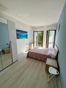 Katil atau katil-katil dalam bilik di Appartamento Blu Marine Brescia +7 gambar