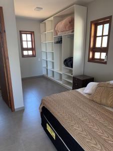 Ένα ή περισσότερα κρεβάτια σε δωμάτιο στο Casa Cutiera