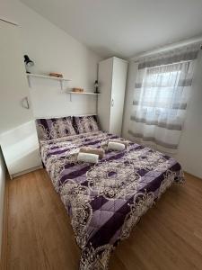 Postel nebo postele na pokoji v ubytování Kuća Renata