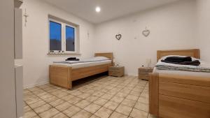 Postel nebo postele na pokoji v ubytování Ferien-/Monteurwohnung im Odw.