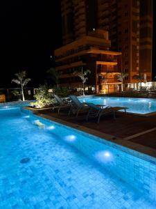 Bazén v ubytování Praia dos Milionários - Ilhéus - Apartamento Duna 403 com 2 quartos - Completo - Vista mar - Conforto nebo v jeho okolí