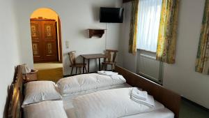 Postel nebo postele na pokoji v ubytování Haus Alpina by Châtel Reizen
