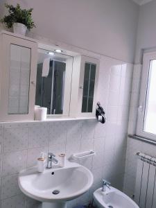 Koupelna v ubytování F.A.M. ROOMS