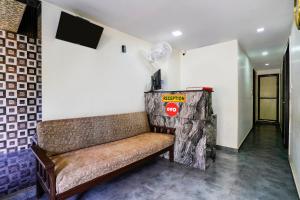 Posezení v ubytování Hotel O Ashwi