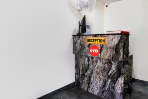 Certifikát, hodnocení, plakát nebo jiný dokument vystavený v ubytování Hotel O Ashwi