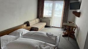 Postel nebo postele na pokoji v ubytování Haus Alpina by Châtel Reizen