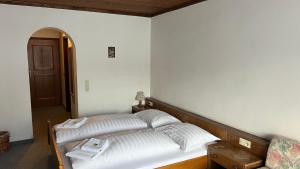 Postel nebo postele na pokoji v ubytování Haus Alpina by Châtel Reizen
