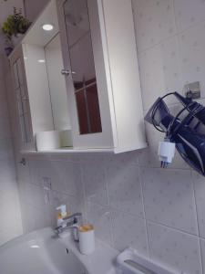 Koupelna v ubytování F.A.M. ROOMS