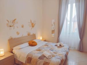 Postel nebo postele na pokoji v ubytování F.A.M. ROOMS