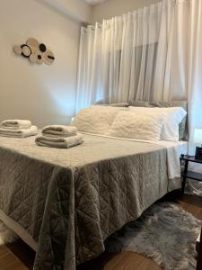 Ένα ή περισσότερα κρεβάτια σε δωμάτιο στο Emilys Apartment