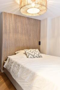 Katil atau katil-katil dalam bilik di Design Apartment zum Wohlfühlen