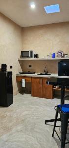 Kuchyň nebo kuchyňský kout v ubytování Casitas Merida + 37 fotografií