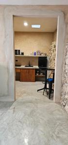 Kuchyň nebo kuchyňský kout v ubytování Casitas Merida