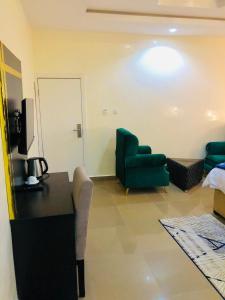 Zona d'estar a Udokanson Hotel And Suites