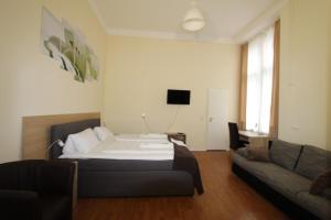 Ένα ή περισσότερα κρεβάτια σε δωμάτιο στο City Hotel Gotland