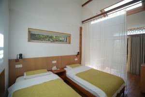 Letto o letti in una camera di 黄山绪礼民宿