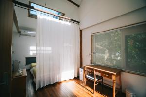 TV o dispositivi per l'intrattenimento presso 黄山绪礼民宿