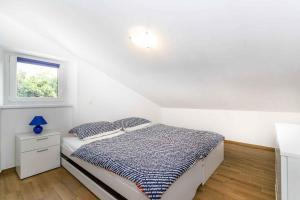 Ein Bett oder Betten in einem Zimmer der Unterkunft Apartment in Malinska - Insel Krk 38057