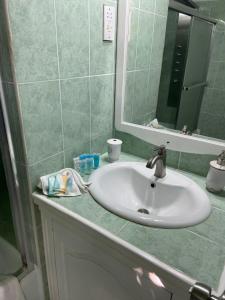 A bathroom at Seabliss Villa