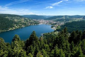 a view of a lake in the mountains at G2 Fully equipped apartment 1 à 4 pers 3 stars WiFi in Le Tholy