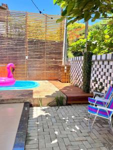 Foto de Casa Arborizada com Piscina