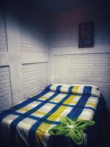 Voodi või voodid majutusasutuse Managua Hotel Oasis toas