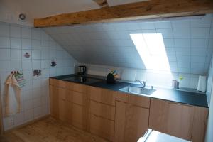 Kuchyň nebo kuchyňský kout v ubytování Hirschen B&B