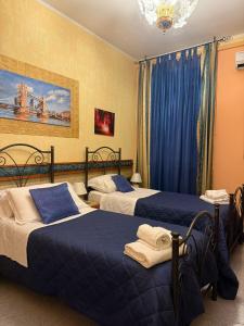 Posteľ alebo postele v izbe v ubytovaní B&B Armonia