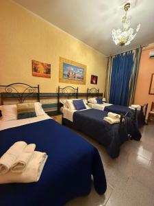 Posteľ alebo postele v izbe v ubytovaní B&B Armonia