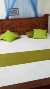 Postel nebo postele na pokoji v ubytování New Manik Homestay + 4 fotografie