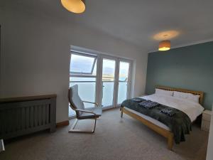 Postel nebo postele na pokoji v ubytování Penfro sea view