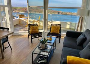 a living room with a view of the ocean at Les Pierres Marines in Le Conquet