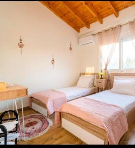 Ένα ή περισσότερα κρεβάτια σε δωμάτιο στο Blue Waves House 2