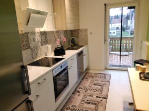 Η κουζίνα ή μικρή κουζίνα στο Ferienwohnung Bildchenstrasse